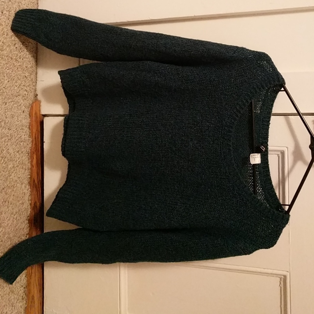 Wool, polyester knit sweater.